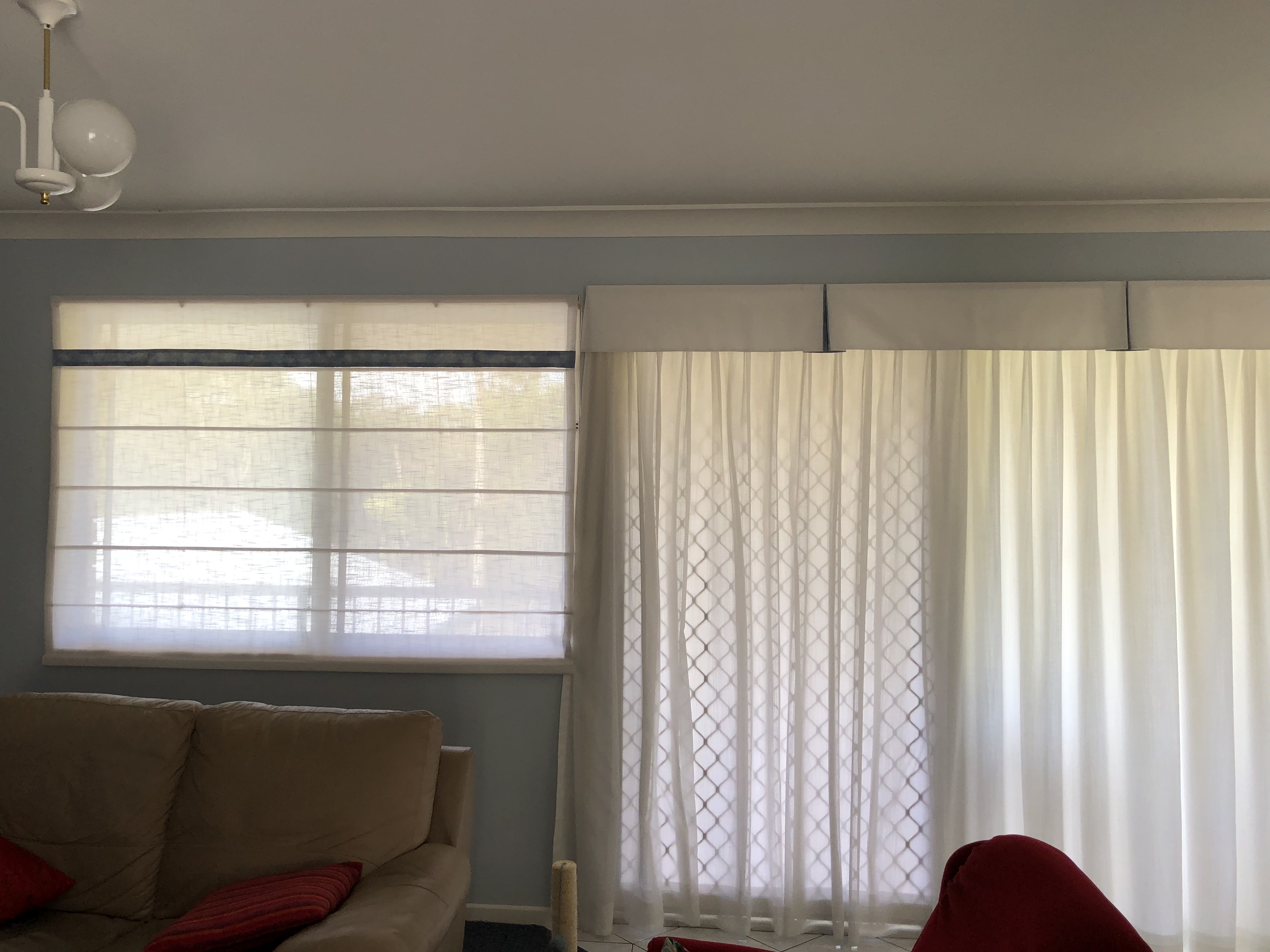 Soft roman blinds with matching curtains and valances